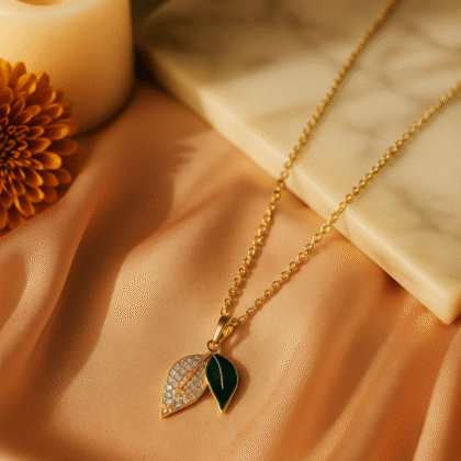 Dual Leaf Pendant Necklace – Gold Chain with Green Enamel & Crystal Detailing